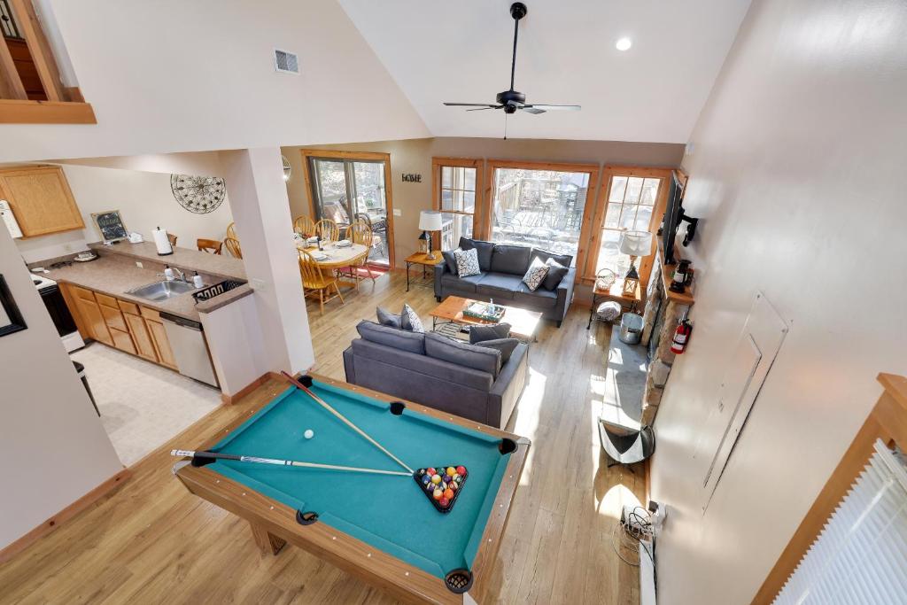 an overhead view of a living room with a pool table at Pocono Mountain Home , Hot Tub- 1 Mile To Skiing! in Tannersville