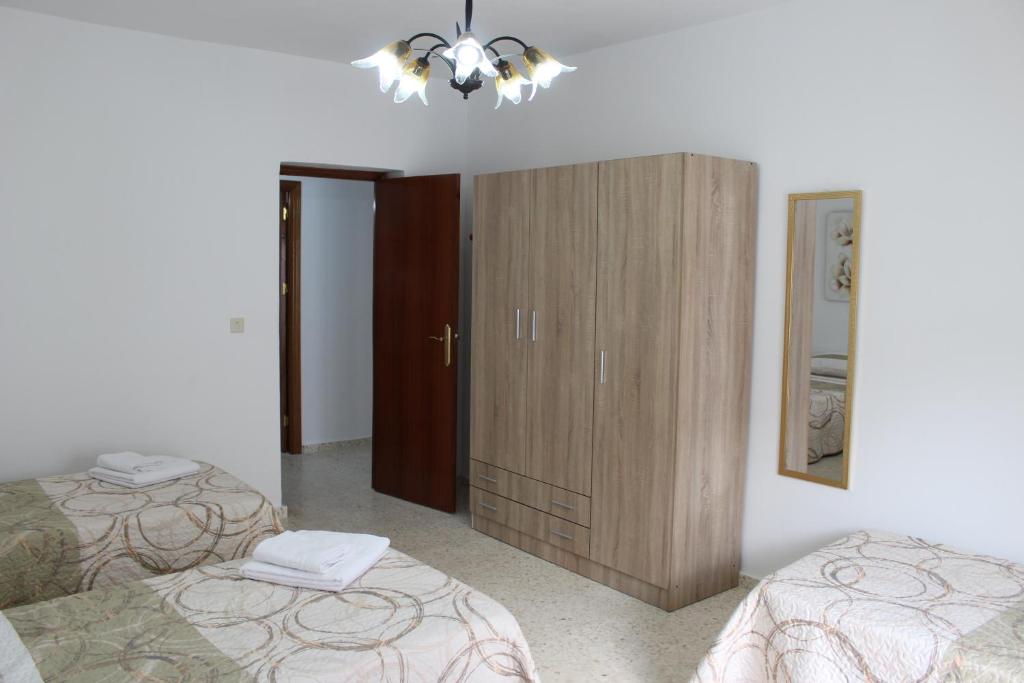Postel nebo postele na pokoji v ubytování El Rincón de Matías (Apartamento turístico)