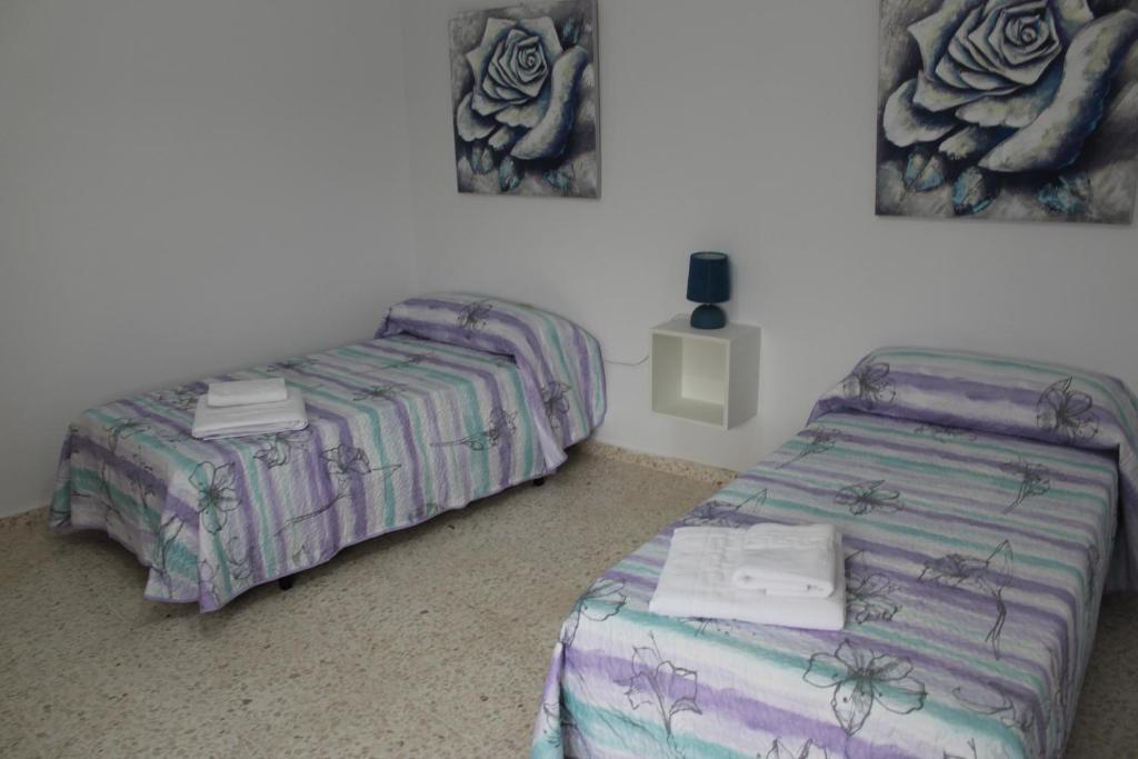Postel nebo postele na pokoji v ubytování El Rincón de Matías (Apartamento turístico)