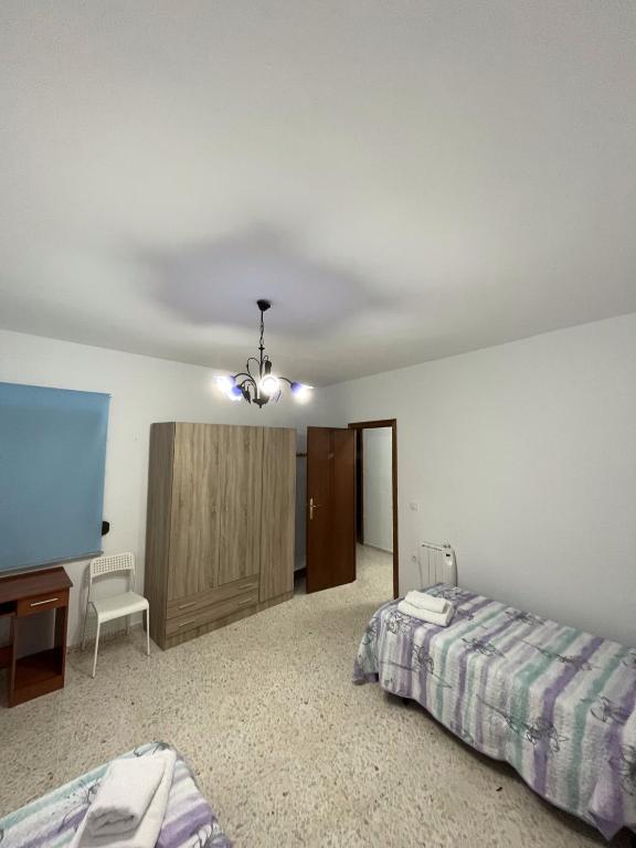 Postel nebo postele na pokoji v ubytování El Rincón de Matías (Apartamento turístico)