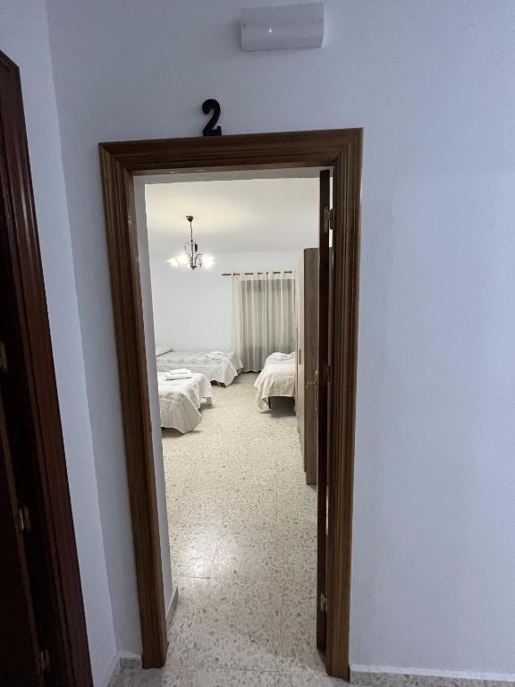 Postel nebo postele na pokoji v ubytování El Rincón de Matías (Apartamento turístico)