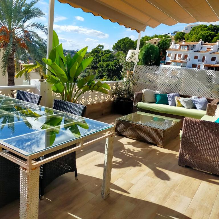 A balcony or terrace at Casa Fleur Casco Antiguo Altea con Piscina privada y Jardin