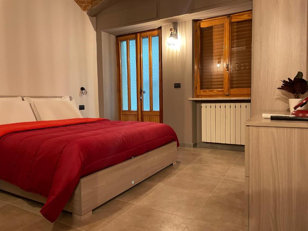 Posteľ alebo postele v izbe v ubytovaní HappyHome Bilocale centro storico Rivarolo Canavese