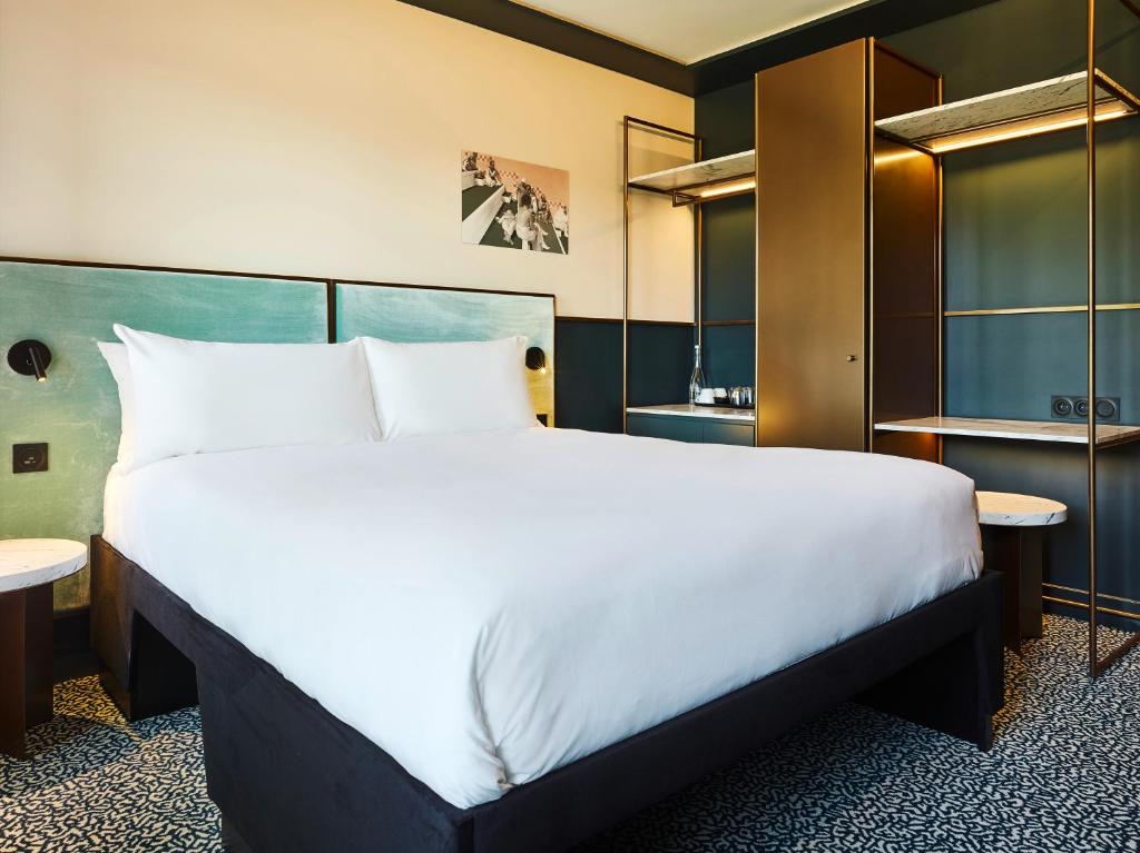 Postel nebo postele na pokoji v ubytování TRIBE Hôtel Le Touquet