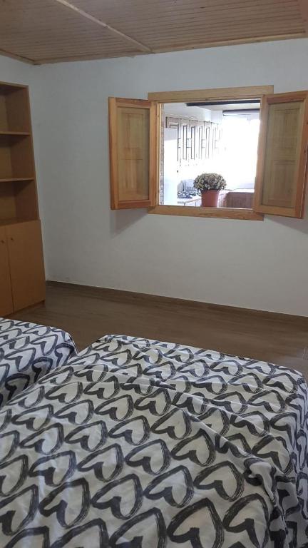 Postel nebo postele na pokoji v ubytování La Cuadra de El Palmital