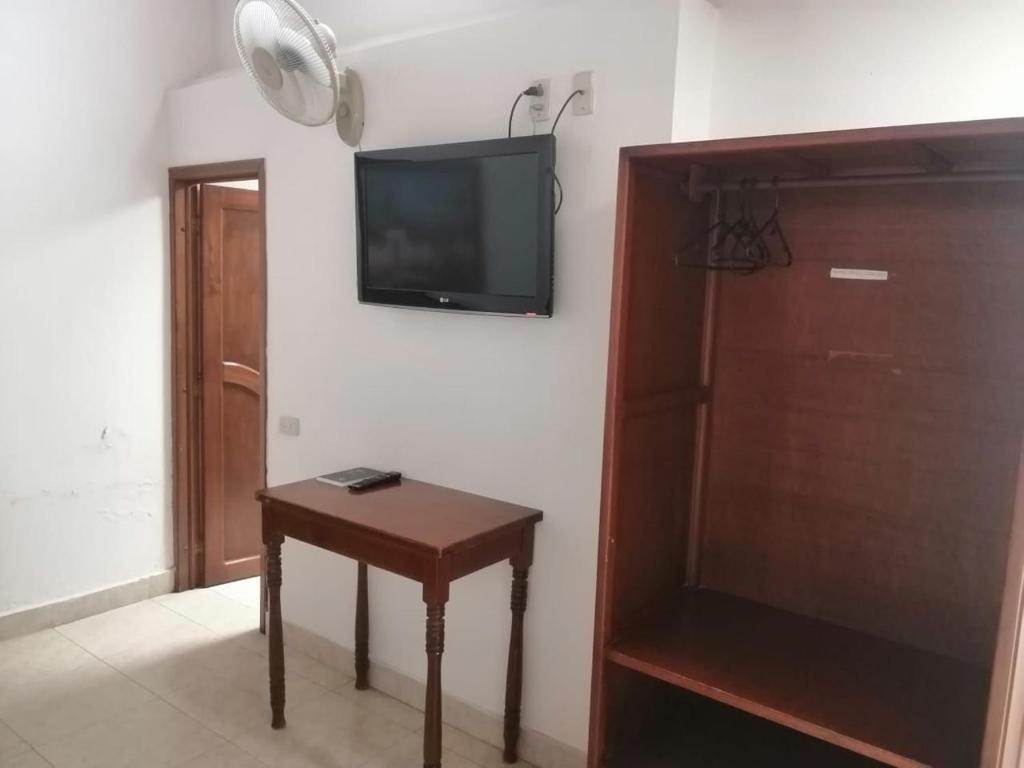 TV a/nebo společenská místnost v ubytování Hotel Real