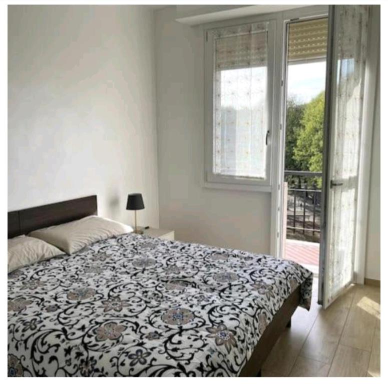 Postel nebo postele na pokoji v ubytování Bi Zeta House: appartamento incantevole a Torino