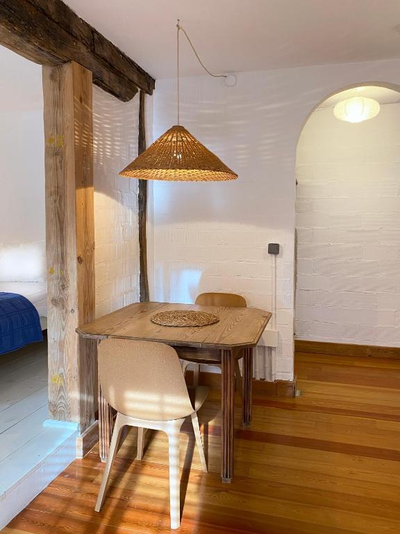 Postel nebo postele na pokoji v ubytování Mañarinegi Apartamentos Rurales