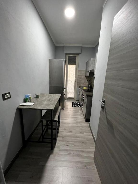 Kuchyň nebo kuchyňský kout v ubytování A.P. Appartamento o camera