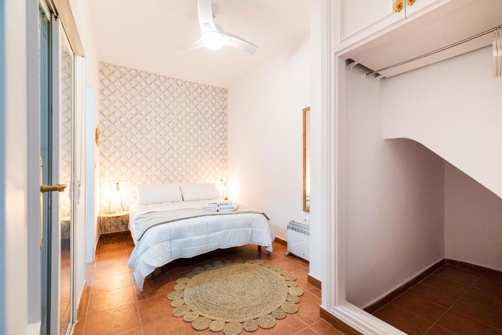 Posteľ alebo postele v izbe v ubytovaní Home4u Casa del Tesoro II