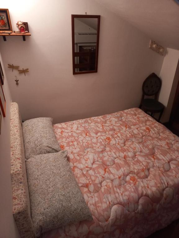 Postel nebo postele na pokoji v ubytování Lo chalet Biancaneve