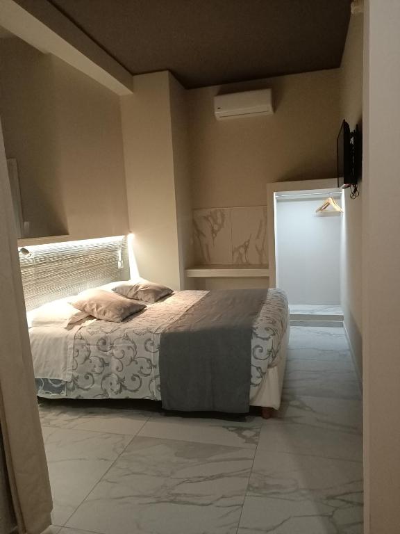 Łóżko lub łóżka w pokoju w obiekcie PVrooms