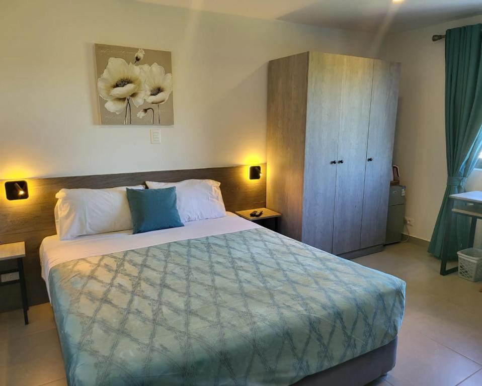 Postel nebo postele na pokoji v ubytování Hotel Oasis-Dream Holidays - La Petite France