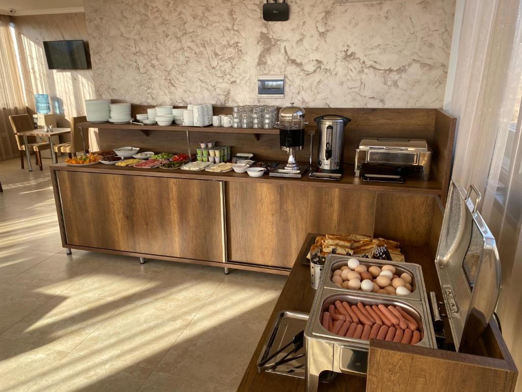 Kuchyň nebo kuchyňský kout v ubytování Palermo Hotel
