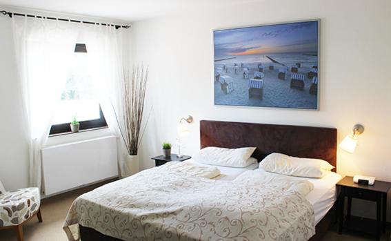 Postel nebo postele na pokoji v ubytování Hotel Seemöwe