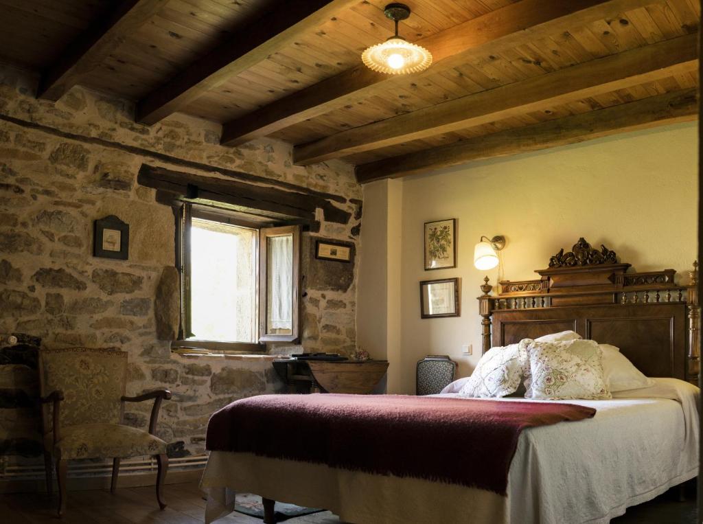 Postel nebo postele na pokoji v ubytování Posada El Prado Mayor