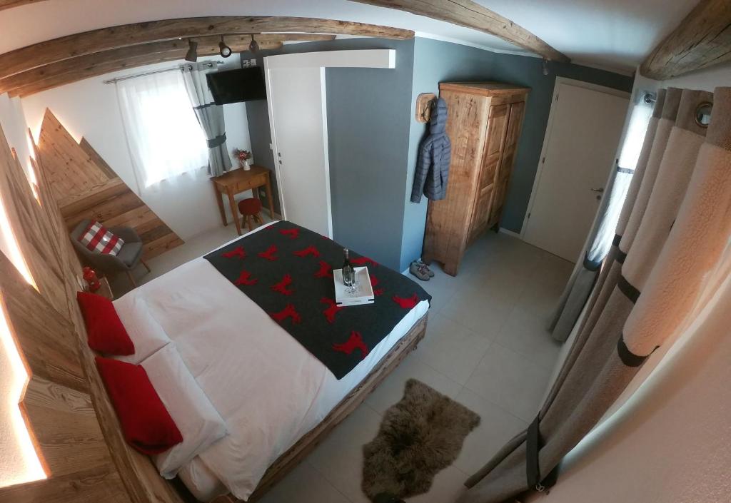 Postel nebo postele na pokoji v ubytování B&B Le Fió