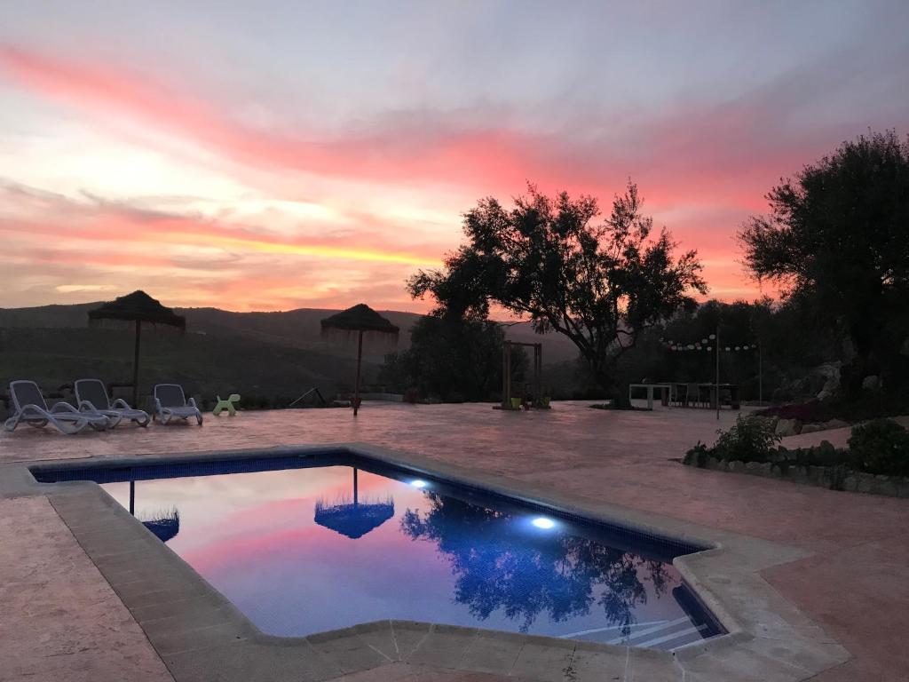 Bazén v ubytování Finca Zayas Casa Rural & Guest Suites nebo v jeho okolí