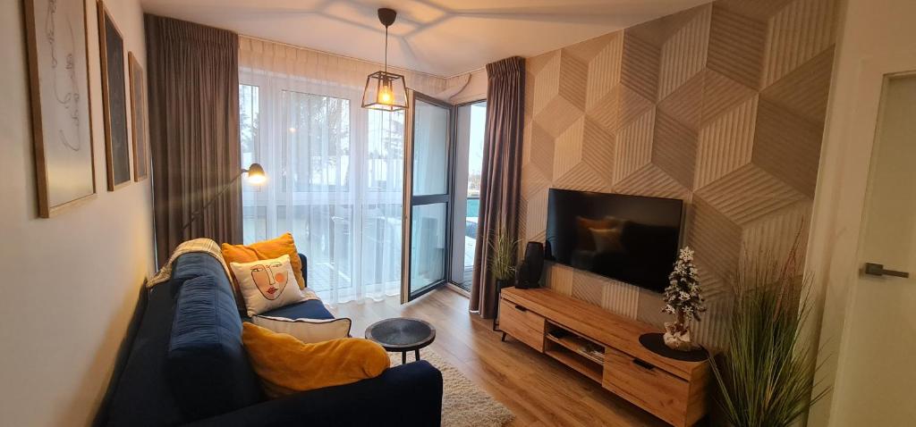 TV a/nebo společenská místnost v ubytování Apartament MAG