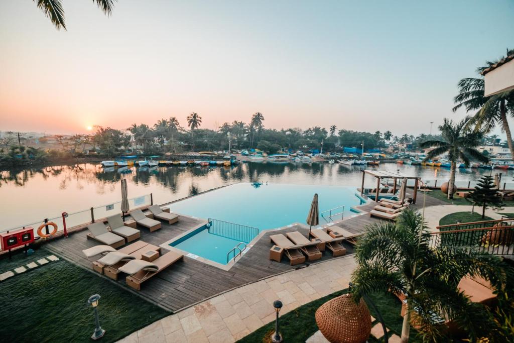 an image of a pool at a resort at Acron Waterfront Resort in Baga