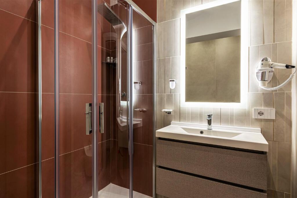 Koupelna v ubytování Petit Hotel