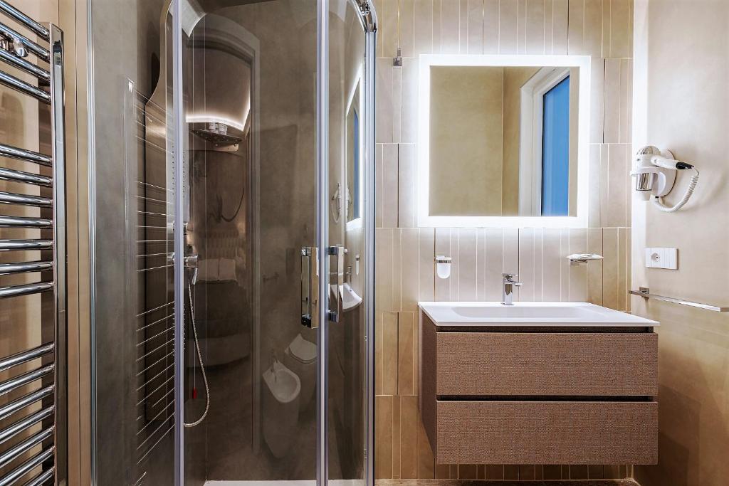 Koupelna v ubytování Petit Hotel
