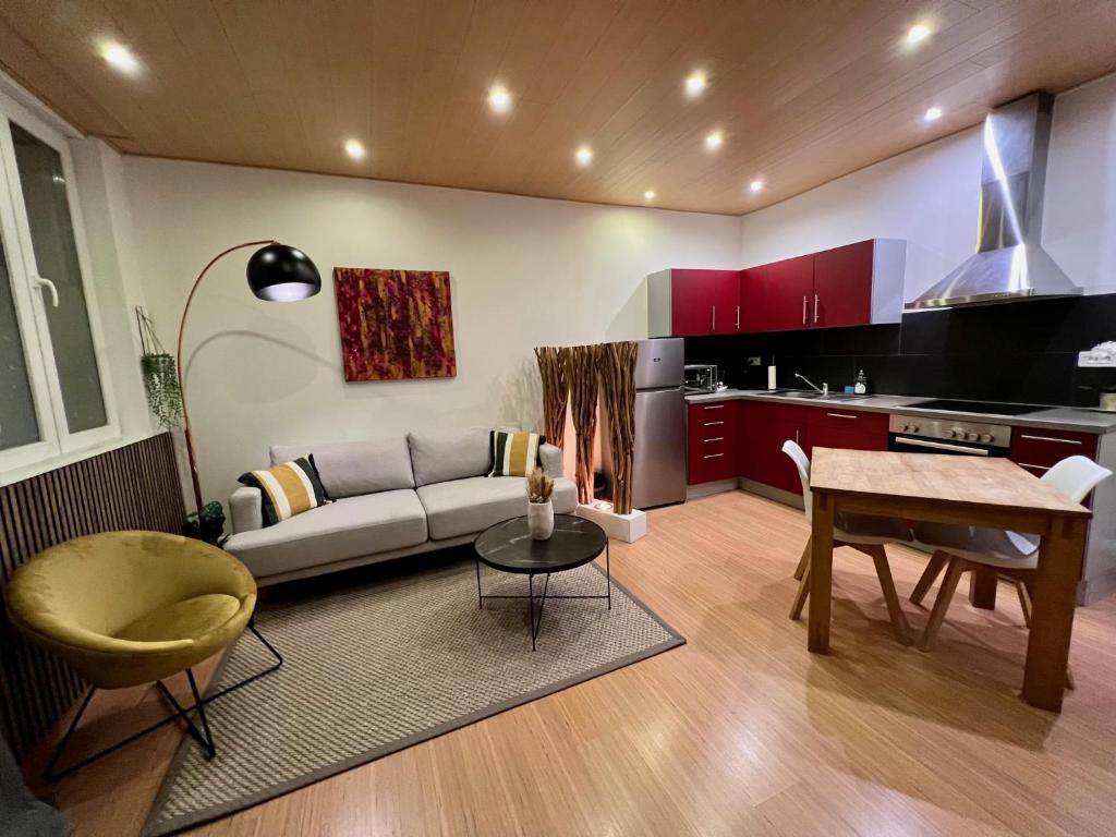 Kuchyňa alebo kuchynka v ubytovaní Jadore - Appartements meublés Mulhouse Ville