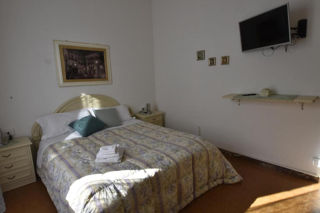Posteľ alebo postele v izbe v ubytovaní La casa di Nonno
