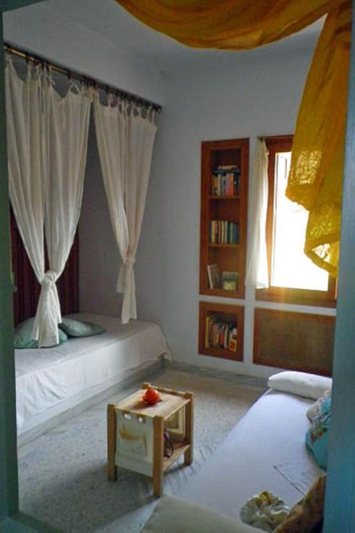Postel nebo postele na pokoji v ubytování Villa Rodialos