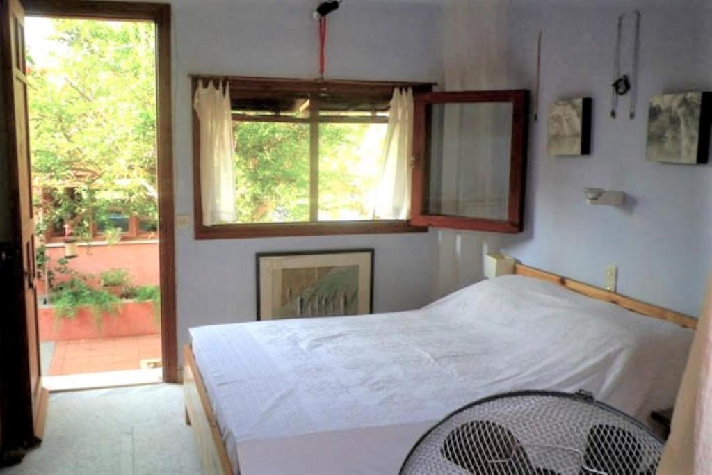 Postel nebo postele na pokoji v ubytování Villa Rodialos