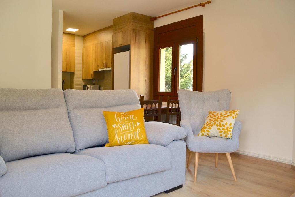 Posezení v ubytování Apartament familiar amb vistes i cèntric by RURAL D'ÀNEU