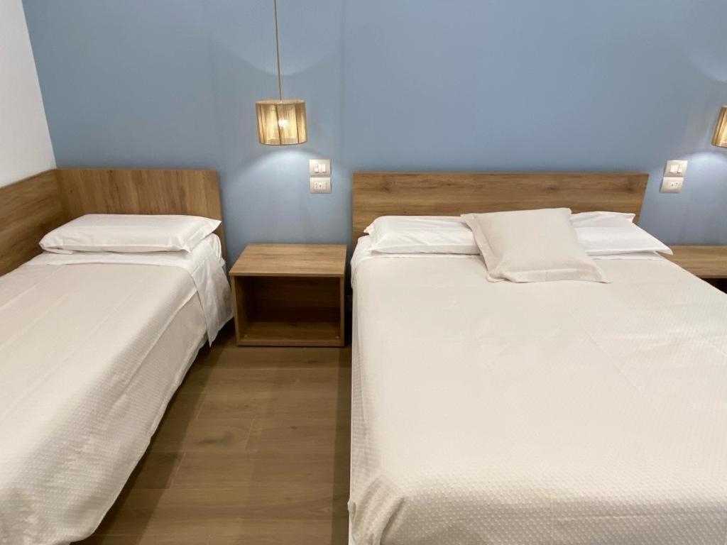Postel nebo postele na pokoji v ubytování B&B MoMi Sorrento