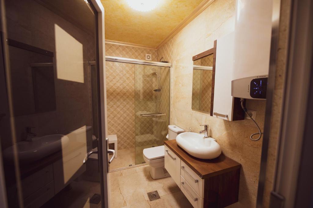 Koupelna v ubytování Hotel Premium