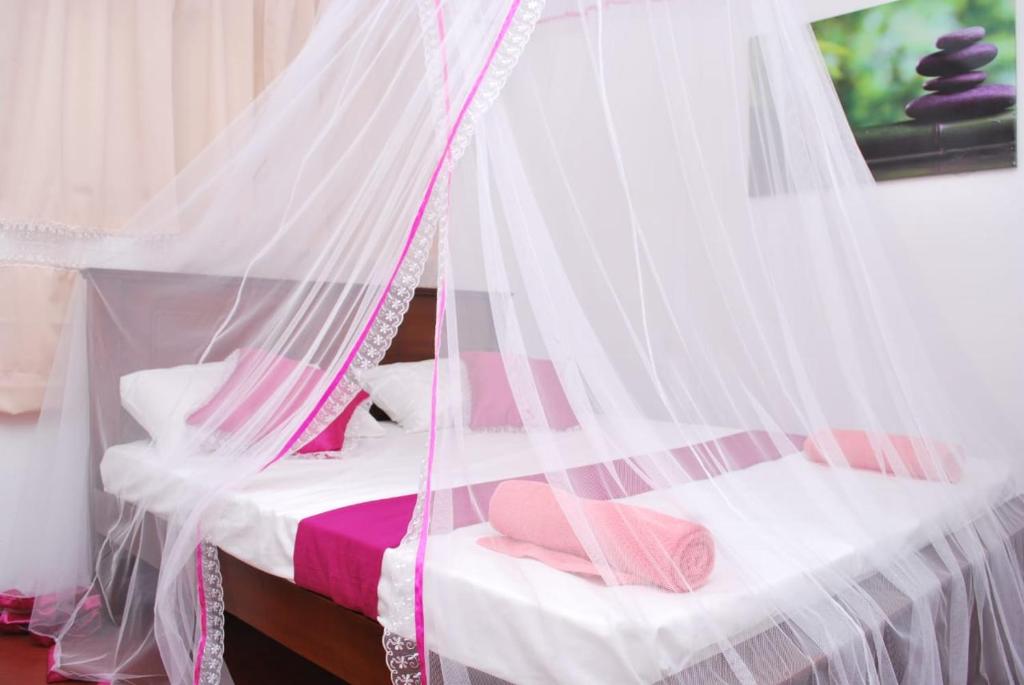 Ένα ή περισσότερα κρεβάτια σε δωμάτιο στο Villa Seven Rich