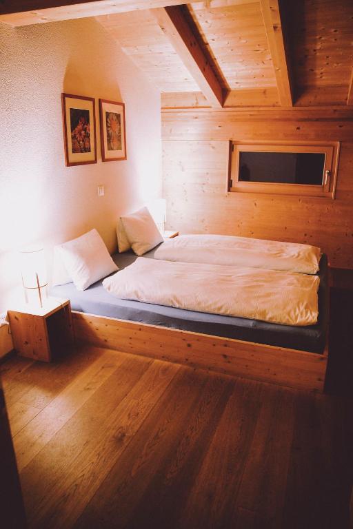 Postel nebo postele na pokoji v ubytování Berghaus Sulzfluh