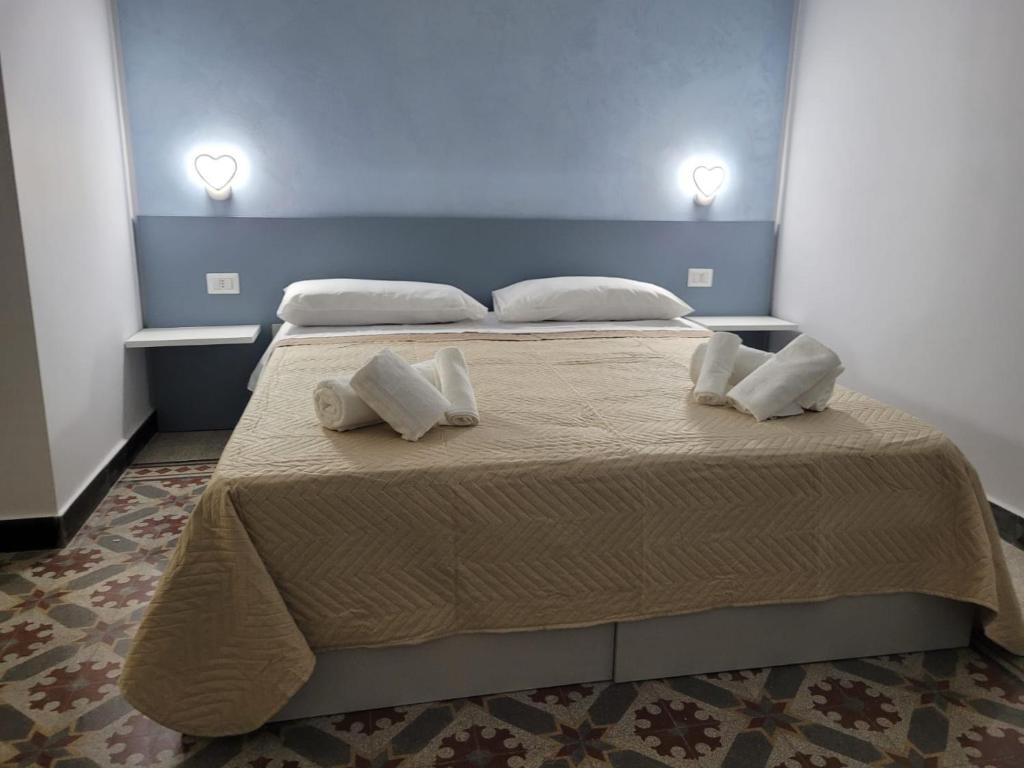 Postel nebo postele na pokoji v ubytování B&B Leon