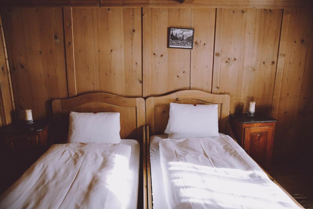 Postel nebo postele na pokoji v ubytování Berghaus Sulzfluh
