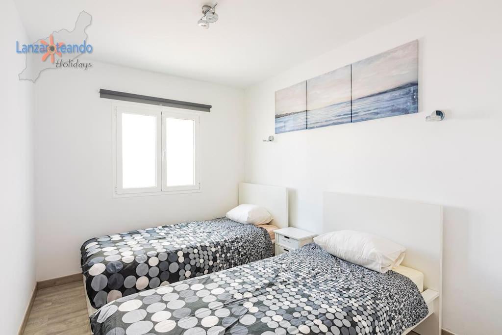 Łóżko lub łóżka w pokoju w obiekcie Vivienda Vacacional Casa Las Cucharas