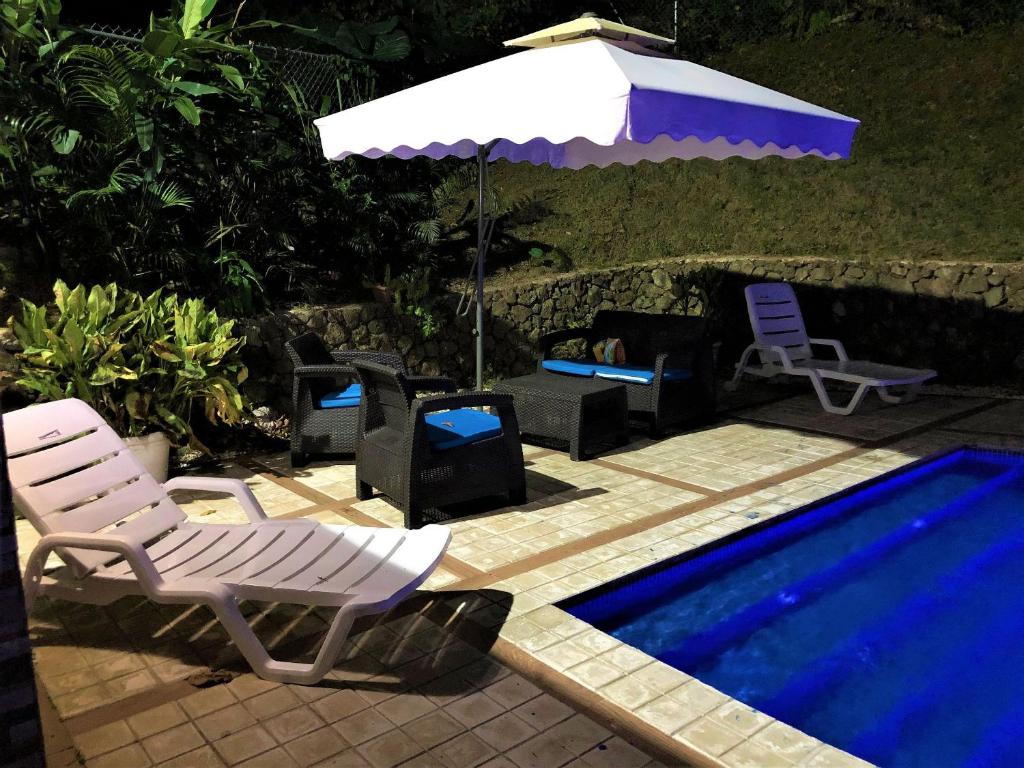Bazén v ubytování Green Village By Hospedify, Hermosa Villa En Las Alturas con Piscina, Billar, y BBQ nebo v jeho okolí