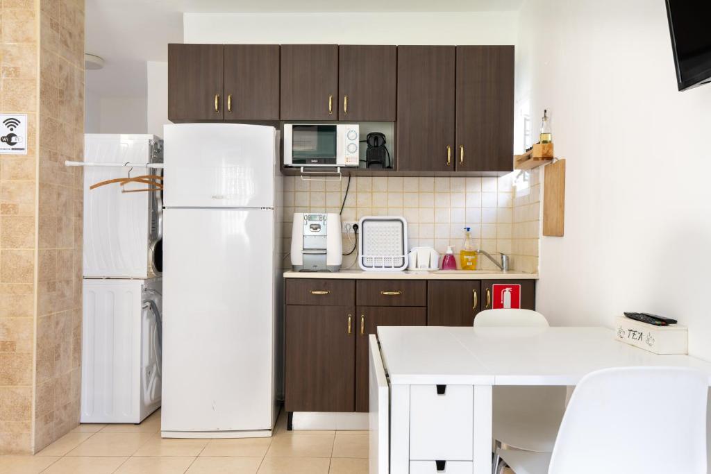Kuchyň nebo kuchyňský kout v ubytování Yagen boutique apartments