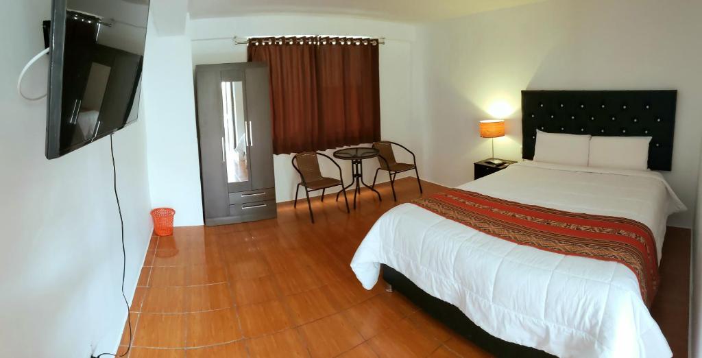 Hostal Cusco de mis Sueños客房内的一张或多张床位