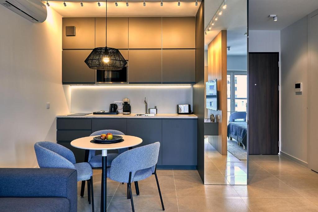 Kuchyňa alebo kuchynka v ubytovaní Mennica Residence Deluxe