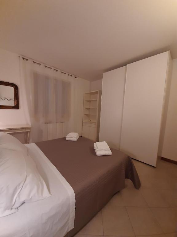 Postel nebo postele na pokoji v ubytování Casa di Clara