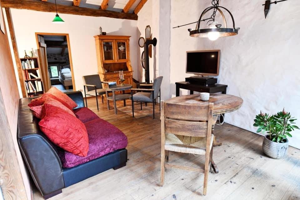 Posedenie v ubytovaní Gîte Appartement dans maison de village