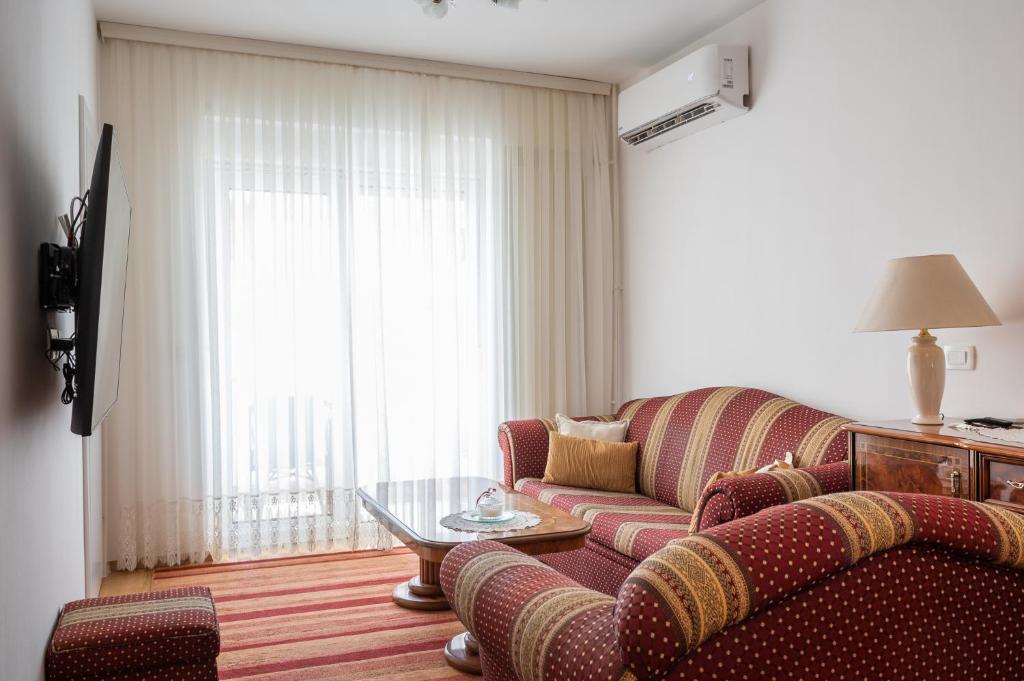 Televízia a/alebo spoločenská miestnosť v ubytovaní Apartments Zagreb West