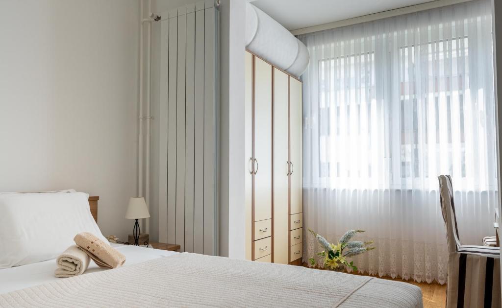 Posteľ alebo postele v izbe v ubytovaní Apartments Zagreb West