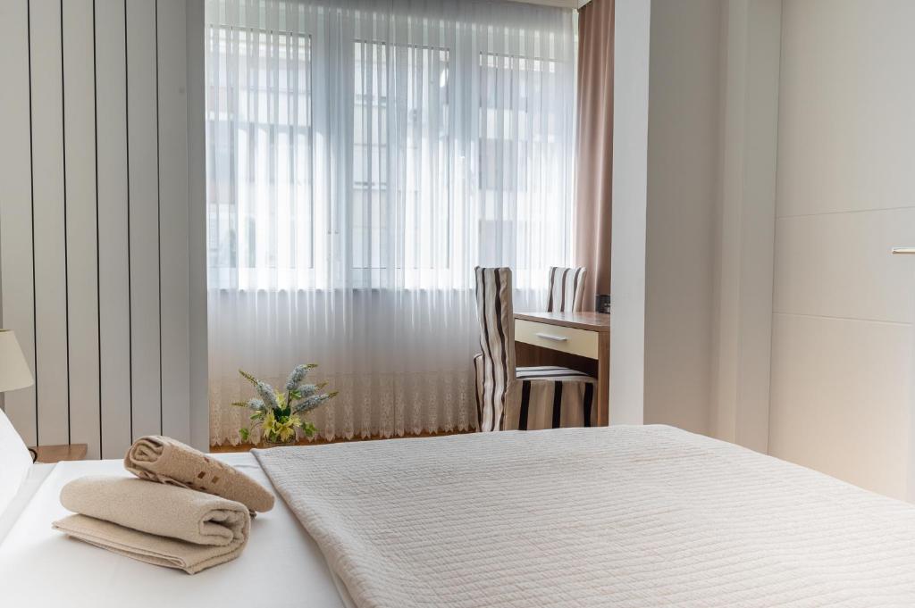 Posteľ alebo postele v izbe v ubytovaní Apartments Zagreb West