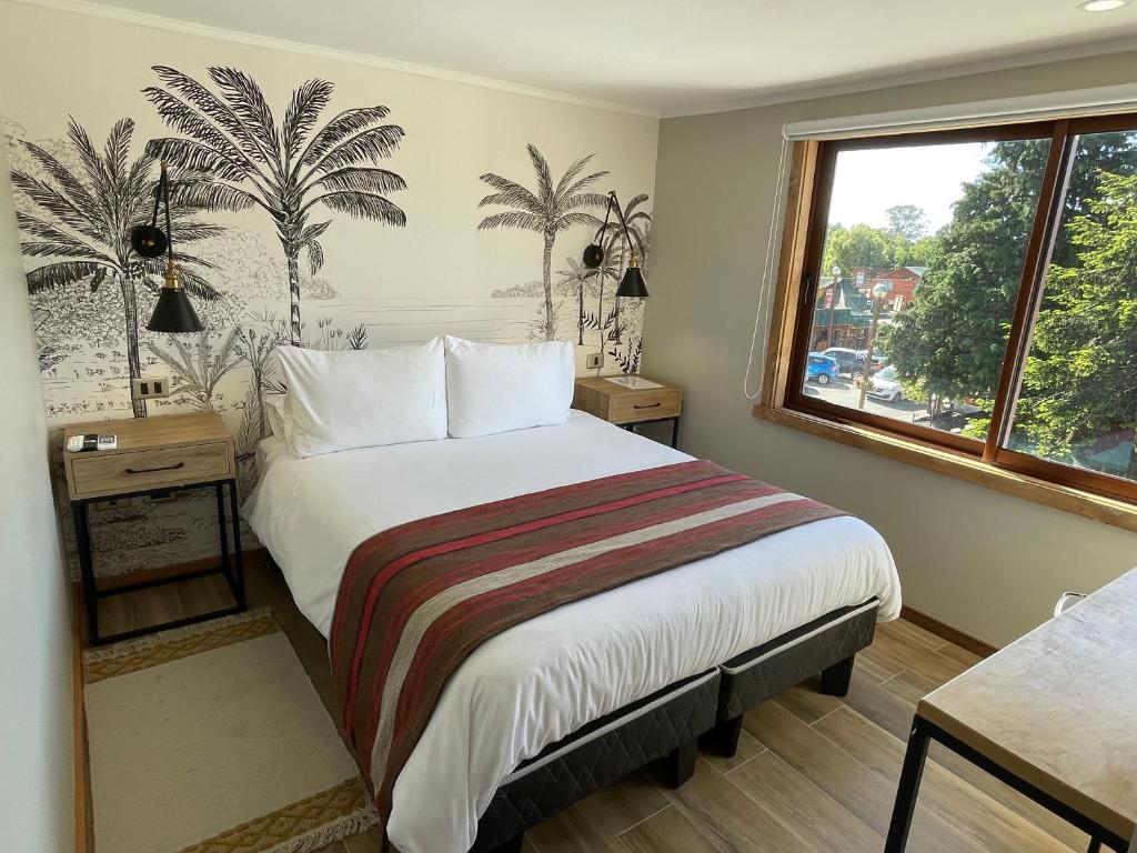 Postel nebo postele na pokoji v ubytování Mawün Hotel Pucón