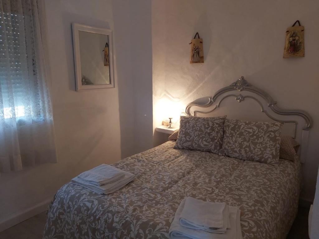 Posteľ alebo postele v izbe v ubytovaní Casa Rural "La Casita"