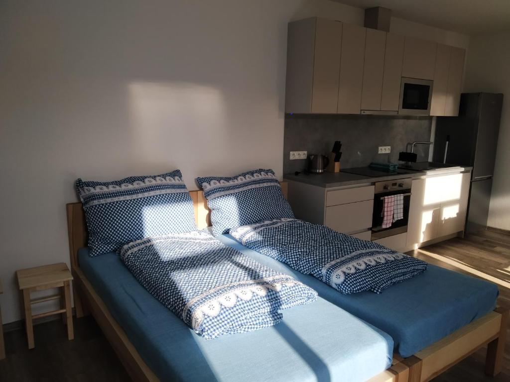 Postel nebo postele na pokoji v ubytování Penzion Na výminku